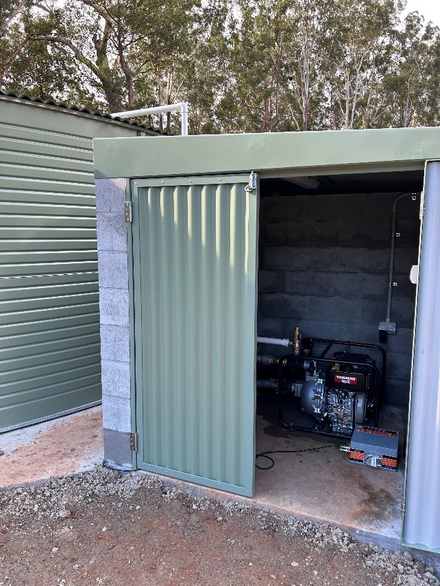 TankDose system installed and wired into a fuel storage shed